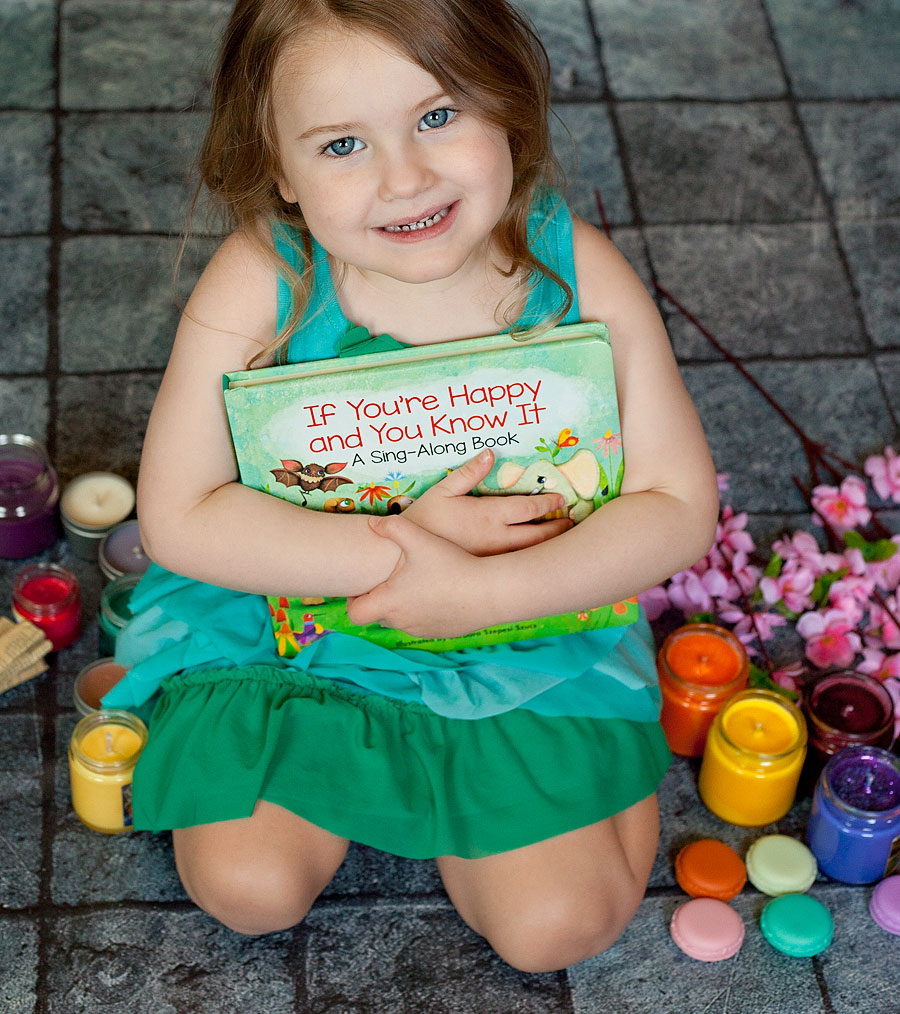 This adorable board book illustrated by Barbara Szepesi Szucs has the words to the classic children's song, "If You're Happy And You Know It" paired with wonderfully whimsical pictures of animals playing together at a playground. My littles LOOVE it!  | Review of free book by Running With Spears #zonderkidz #boardbook #booksforbabies