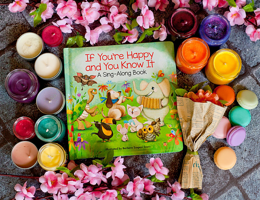 This adorable board book illustrated by Barbara Szepesi Szucs has the words to the classic children's song, "If You're Happy And You Know It" paired with wonderfully whimsical pictures of animals playing together at a playground. My littles LOOVE it!  | Review of free book by Running With Spears #zonderkidz #boardbook #booksforbabies